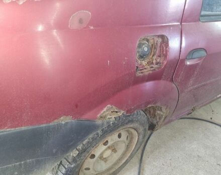 Красный Дачия Логан, объемом двигателя 1.4 л и пробегом 360 тыс. км за 900 $, фото 4 на Automoto.ua