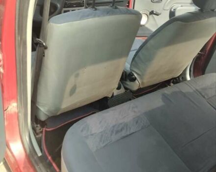 Червоний Дачія Logan, об'ємом двигуна 1.4 л та пробігом 221 тис. км за 3200 $, фото 2 на Automoto.ua