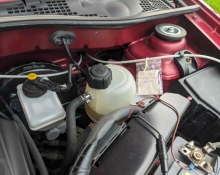 Красный Дачия Логан, объемом двигателя 1.6 л и пробегом 204 тыс. км за 3850 $, фото 19 на Automoto.ua