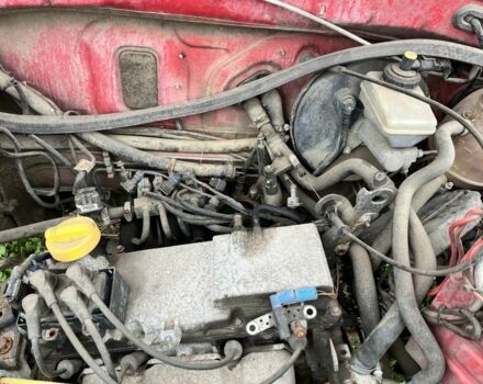 Красный Дачия Логан, объемом двигателя 1.4 л и пробегом 3 тыс. км за 300 $, фото 3 на Automoto.ua