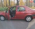 Красный Дачия Логан, объемом двигателя 1.4 л и пробегом 197 тыс. км за 3950 $, фото 1 на Automoto.ua