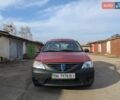 Красный Дачия Логан, объемом двигателя 1.6 л и пробегом 205 тыс. км за 3900 $, фото 1 на Automoto.ua