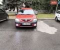 Красный Дачия Логан, объемом двигателя 1.6 л и пробегом 228 тыс. км за 4100 $, фото 1 на Automoto.ua
