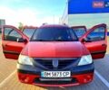 Красный Дачия Логан, объемом двигателя 1.6 л и пробегом 190 тыс. км за 5200 $, фото 1 на Automoto.ua