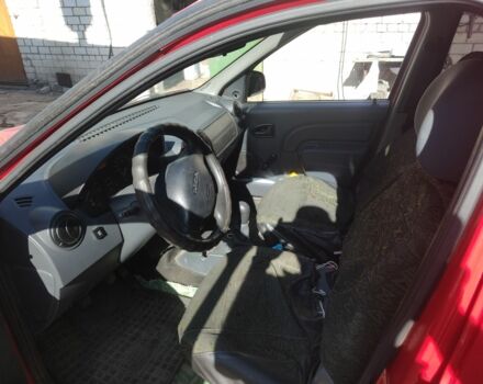 Красный Дачия Логан, объемом двигателя 1.4 л и пробегом 120 тыс. км за 3800 $, фото 9 на Automoto.ua