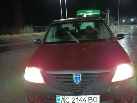 Красный Дачия Логан, объемом двигателя 1.4 л и пробегом 333 тыс. км за 1222 $, фото 1 на Automoto.ua