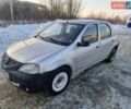Серый Дачия Логан, объемом двигателя 1.39 л и пробегом 296 тыс. км за 2900 $, фото 1 на Automoto.ua