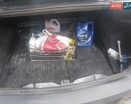 Серый Дачия Логан, объемом двигателя 1.39 л и пробегом 310 тыс. км за 2000 $, фото 7 на Automoto.ua