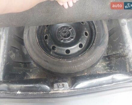 Серый Дачия Логан, объемом двигателя 1.39 л и пробегом 310 тыс. км за 2000 $, фото 8 на Automoto.ua