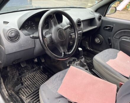 Серый Дачия Логан, объемом двигателя 1.4 л и пробегом 230 тыс. км за 1899 $, фото 4 на Automoto.ua