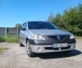 Серый Дачия Логан, объемом двигателя 1.4 л и пробегом 240 тыс. км за 3000 $, фото 1 на Automoto.ua