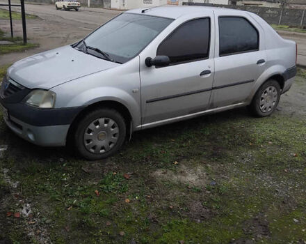 Серый Дачия Логан, объемом двигателя 1.39 л и пробегом 150 тыс. км за 3900 $, фото 1 на Automoto.ua