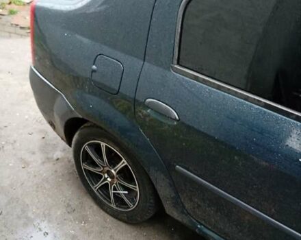 Зелений Дачія Logan, об'ємом двигуна 1.39 л та пробігом 305 тис. км за 3000 $, фото 8 на Automoto.ua