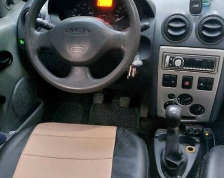 Зелений Дачія Logan, об'ємом двигуна 1.39 л та пробігом 305 тис. км за 3000 $, фото 4 на Automoto.ua