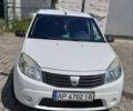 Білий Дачія Sandero, об'ємом двигуна 1.4 л та пробігом 185 тис. км за 4200 $, фото 1 на Automoto.ua
