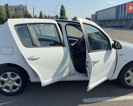 Білий Дачія Sandero, об'ємом двигуна 1.4 л та пробігом 140 тис. км за 4200 $, фото 6 на Automoto.ua
