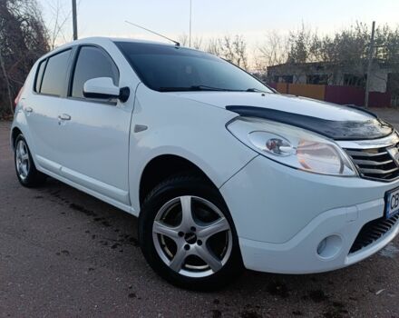 Белый Дачия Сандеро, объемом двигателя 1.1 л и пробегом 230 тыс. км за 4300 $, фото 1 на Automoto.ua