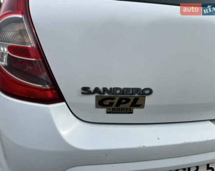 Білий Дачія Sandero, об'ємом двигуна 1.15 л та пробігом 230 тис. км за 3700 $, фото 16 на Automoto.ua