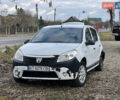 Білий Дачія Sandero, об'ємом двигуна 1.39 л та пробігом 450 тис. км за 1299 $, фото 1 на Automoto.ua