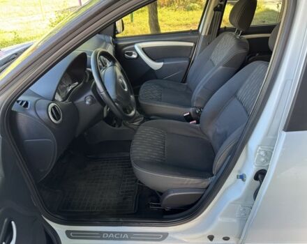 Дачия Сандеро 2012 в Кролевце на Automoto.ua Белый Дачия Сандеро, объемом двигателя 1.6 л и пробегом 180 тыс. км за 6300 $, фото 13 на Automoto.ua