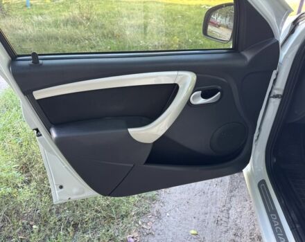 Дачия Сандеро 2012 в Кролевце на Automoto.ua Белый Дачия Сандеро, объемом двигателя 1.6 л и пробегом 180 тыс. км за 6300 $, фото 12 на Automoto.ua