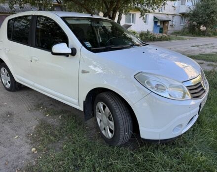 Дачия Сандеро 2012 в Кролевце на Automoto.ua Белый Дачия Сандеро, объемом двигателя 1.6 л и пробегом 180 тыс. км за 6300 $, фото 14 на Automoto.ua