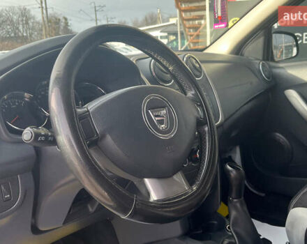 Білий Дачія Sandero, об'ємом двигуна 0.9 л та пробігом 128 тис. км за 5400 $, фото 9 на Automoto.ua