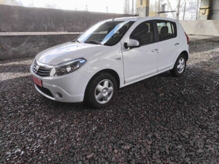 Белый Дачия Сандеро, объемом двигателя 1.6 л и пробегом 240 тыс. км за 4250 $, фото 1 на Automoto.ua