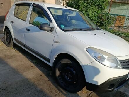 Белый Дачия Сандеро, объемом двигателя 1.4 л и пробегом 200 тыс. км за 4300 $, фото 1 на Automoto.ua