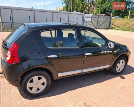Дачия Сандеро 2011 в Полтаве на Automoto.ua Черный Дачия Сандеро, объемом двигателя 1.6 л и пробегом 150 тыс. км за 5200 $, фото 7 на Automoto.ua