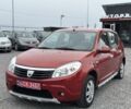 Червоний Дачія Sandero, об'ємом двигуна 1.4 л та пробігом 166 тис. км за 5600 $, фото 1 на Automoto.ua