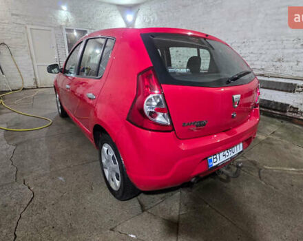 Красный Дачия Сандеро, объемом двигателя 1.39 л и пробегом 176 тыс. км за 5500 $, фото 5 на Automoto.ua