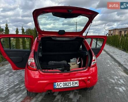 Дачія Sandero 2009 у Луцьку на Automoto.ua Червоний Дачія Sandero, об'ємом двигуна 1.4 л та пробігом 212 тис. км за 3950 $, фото 23 на Automoto.ua