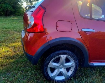 Красный Дачия Сандеро, объемом двигателя 1.6 л и пробегом 143 тыс. км за 6400 $, фото 2 на Automoto.ua