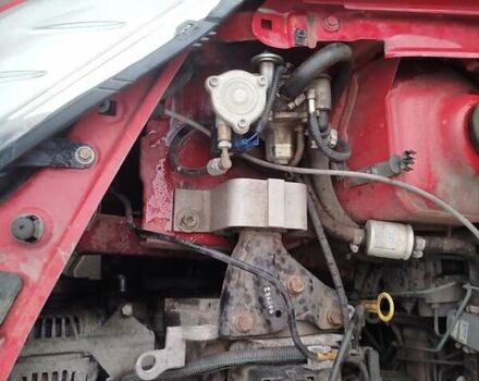 Красный Дачия Сандеро, объемом двигателя 1.4 л и пробегом 290 тыс. км за 3650 $, фото 10 на Automoto.ua