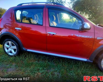 Красный Дачия Сандеро, объемом двигателя 1.6 л и пробегом 143 тыс. км за 6400 $, фото 3 на Automoto.ua