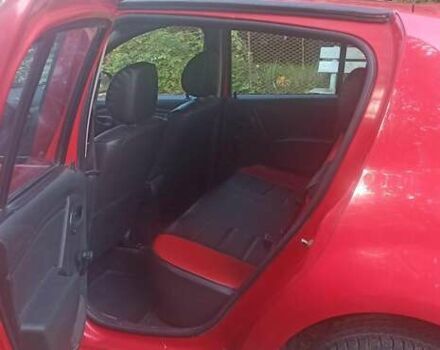 Красный Дачия Сандеро, объемом двигателя 1.4 л и пробегом 208 тыс. км за 4000 $, фото 5 на Automoto.ua