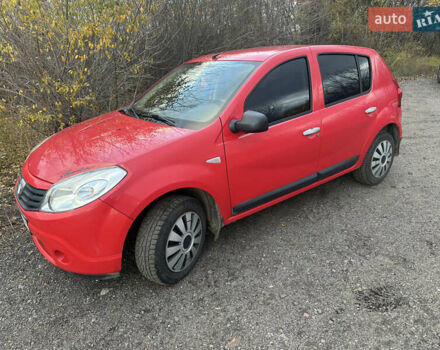 Красный Дачия Сандеро, объемом двигателя 1.39 л и пробегом 175 тыс. км за 4400 $, фото 1 на Automoto.ua