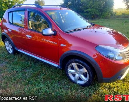 Красный Дачия Сандеро, объемом двигателя 1.6 л и пробегом 143 тыс. км за 6400 $, фото 1 на Automoto.ua