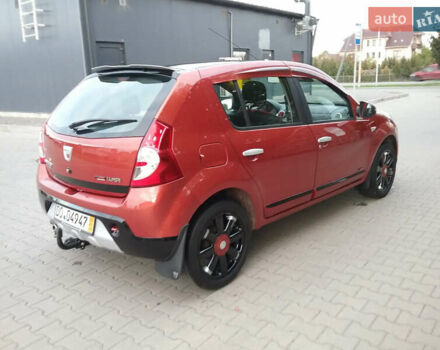 Червоний Дачія Sandero, об'ємом двигуна 1.4 л та пробігом 140 тис. км за 6150 $, фото 1 на Automoto.ua