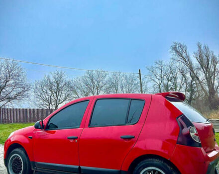 Красный Дачия Сандеро, объемом двигателя 1.39 л и пробегом 200 тыс. км за 3500 $, фото 1 на Automoto.ua