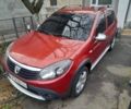 Красный Дачия Сандеро, объемом двигателя 1.6 л и пробегом 153 тыс. км за 5100 $, фото 1 на Automoto.ua