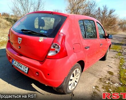 Красный Дачия Сандеро, объемом двигателя 1.4 л и пробегом 243 тыс. км за 4200 $, фото 1 на Automoto.ua