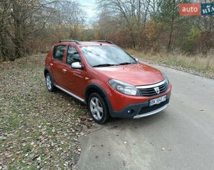 Красный Дачия Сандеро, объемом двигателя 1.6 л и пробегом 145 тыс. км за 7200 $, фото 2 на Automoto.ua