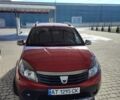 Красный Дачия Сандеро, объемом двигателя 1.6 л и пробегом 196 тыс. км за 5800 $, фото 1 на Automoto.ua