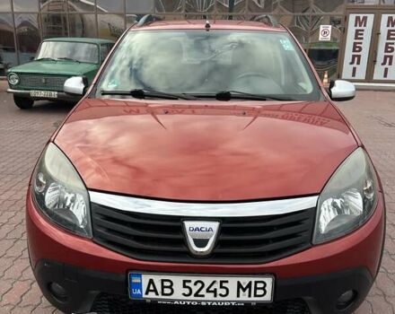 Дачия Сандеро 2011 в Виннице на Automoto.ua Красный Дачия Сандеро, объемом двигателя 1.6 л и пробегом 115 тыс. км за 6950 $, фото 8 на Automoto.ua