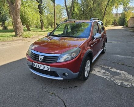 Красный Дачия Сандеро, объемом двигателя 1.6 л и пробегом 200 тыс. км за 7750 $, фото 1 на Automoto.ua