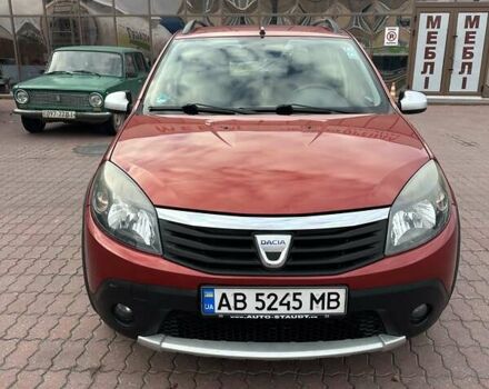 Дачия Сандеро 2011 в Виннице на Automoto.ua Красный Дачия Сандеро, объемом двигателя 1.6 л и пробегом 115 тыс. км за 6950 $, фото 7 на Automoto.ua