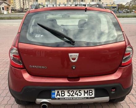 Дачия Сандеро 2011 в Виннице на Automoto.ua Красный Дачия Сандеро, объемом двигателя 1.6 л и пробегом 115 тыс. км за 6950 $, фото 3 на Automoto.ua