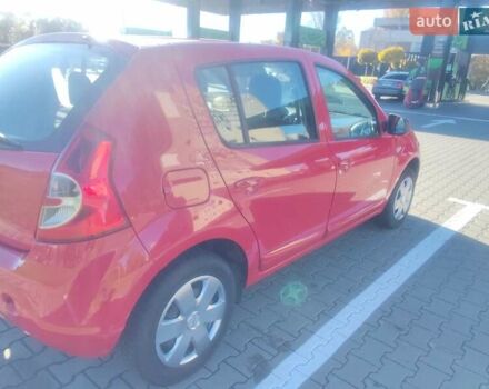 Красный Дачия Сандеро, объемом двигателя 1.2 л и пробегом 143 тыс. км за 5500 $, фото 2 на Automoto.ua